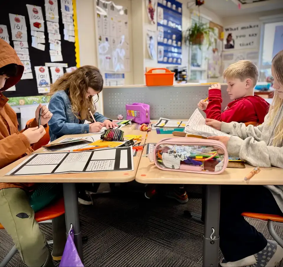Four_MS_students_doing_homework