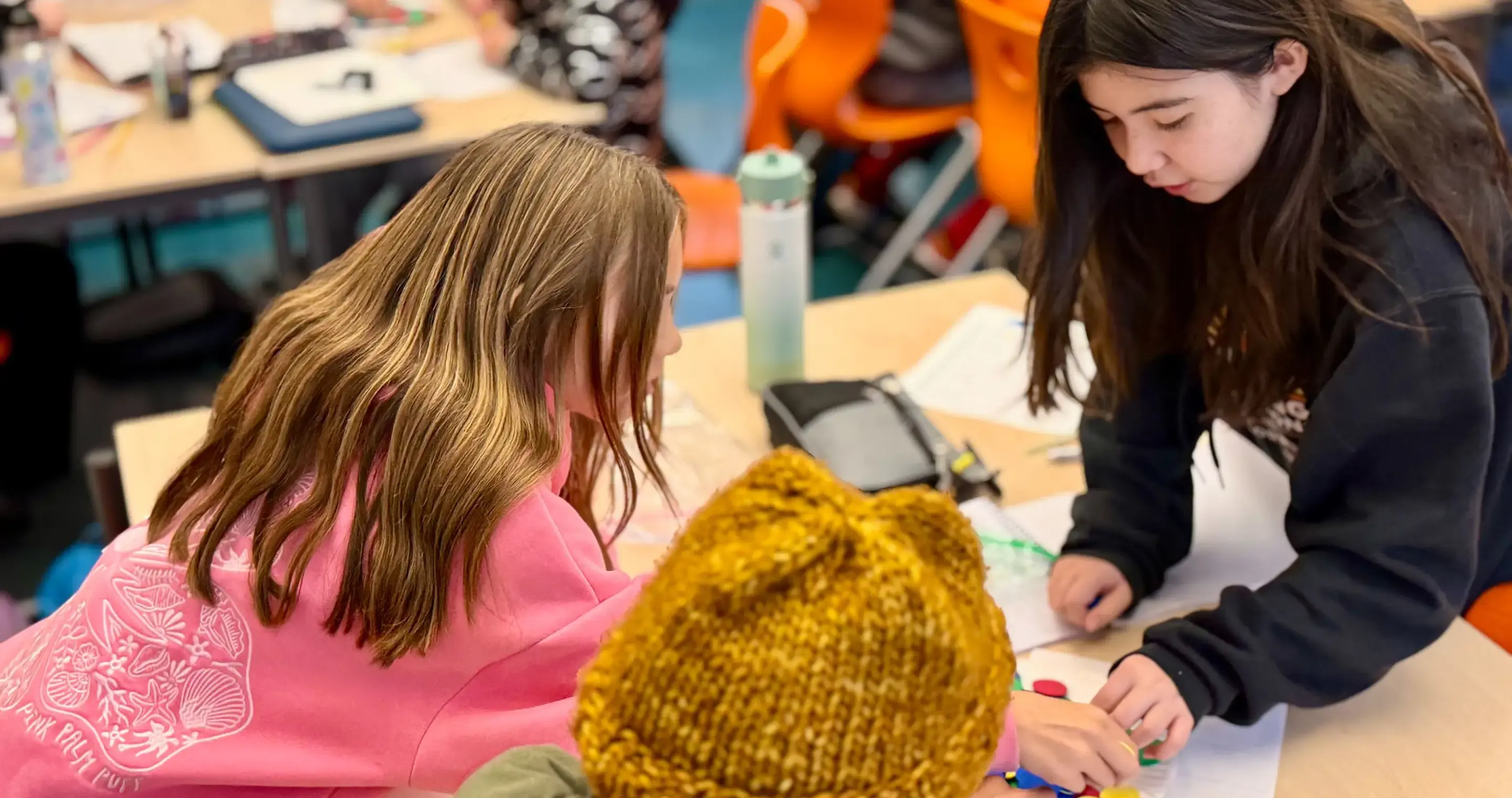 Girl_mentoring_two_students