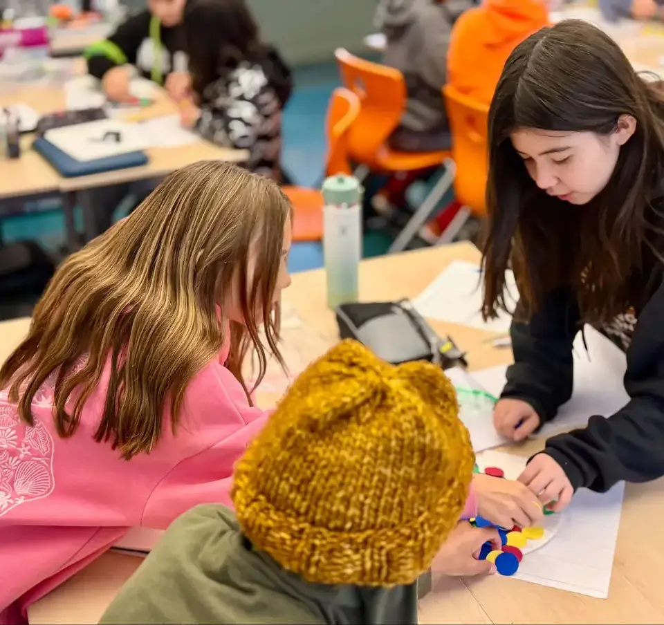 Three girls working together