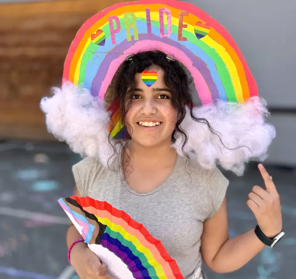 Girl_wearing_pride_day_hat
