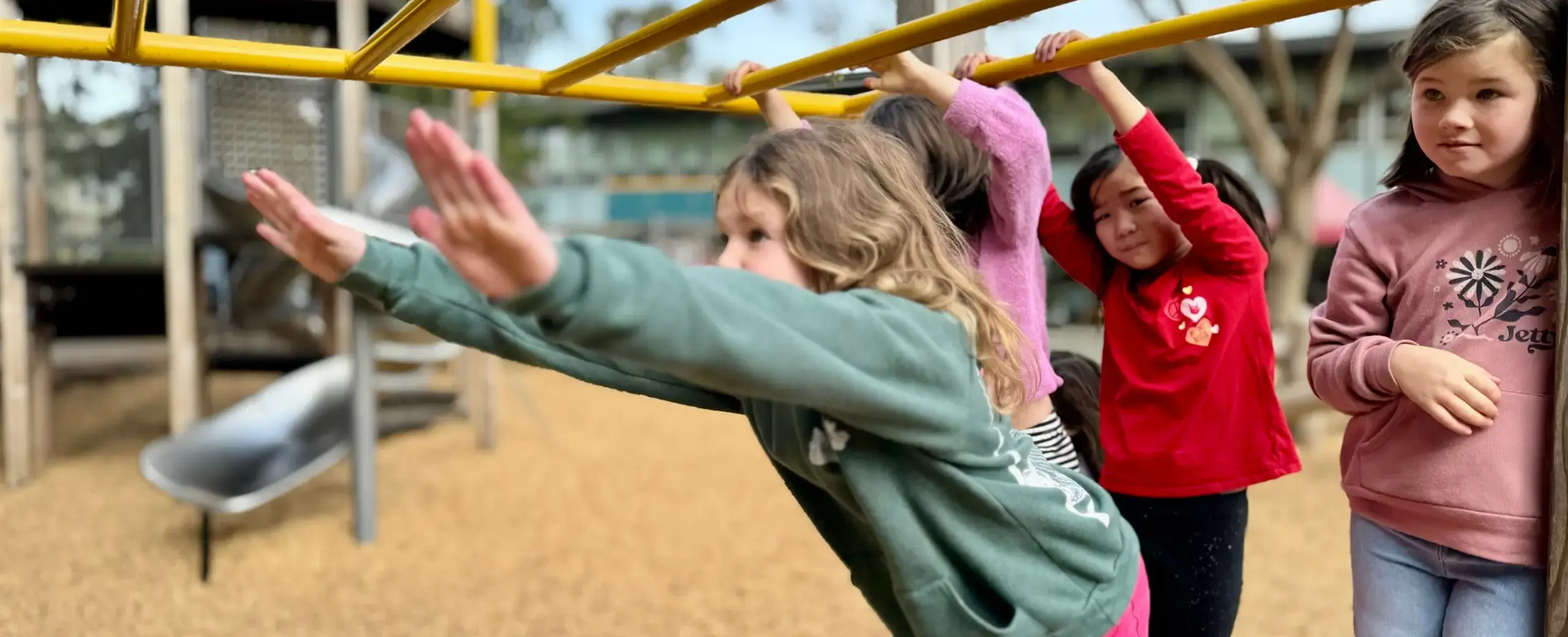 girls on monkey bars