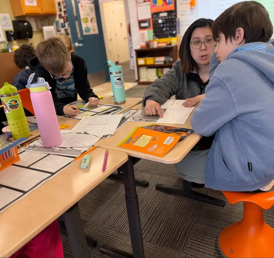 LS_teacher_helping_with_homework