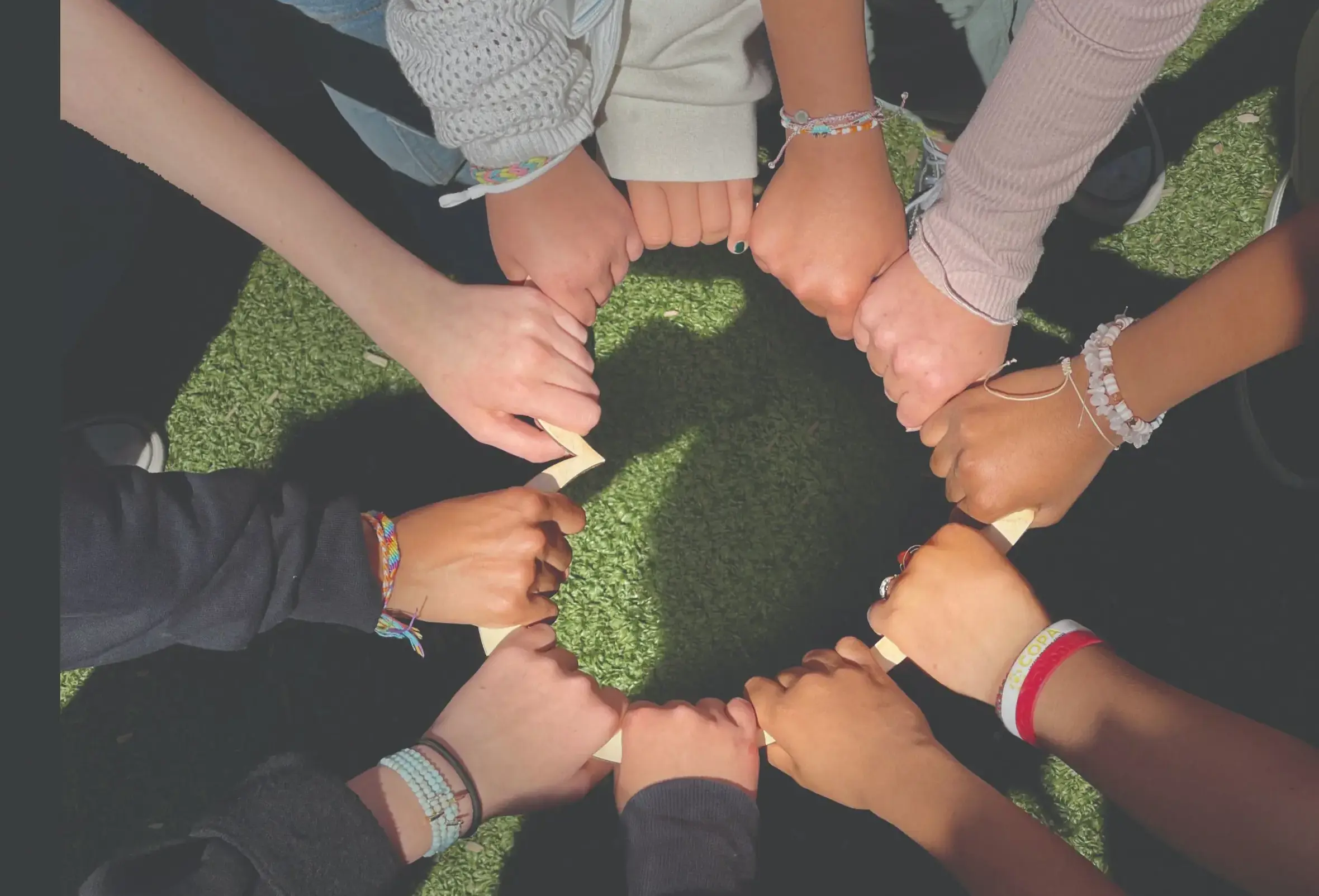 Student_hands_holding_heart
