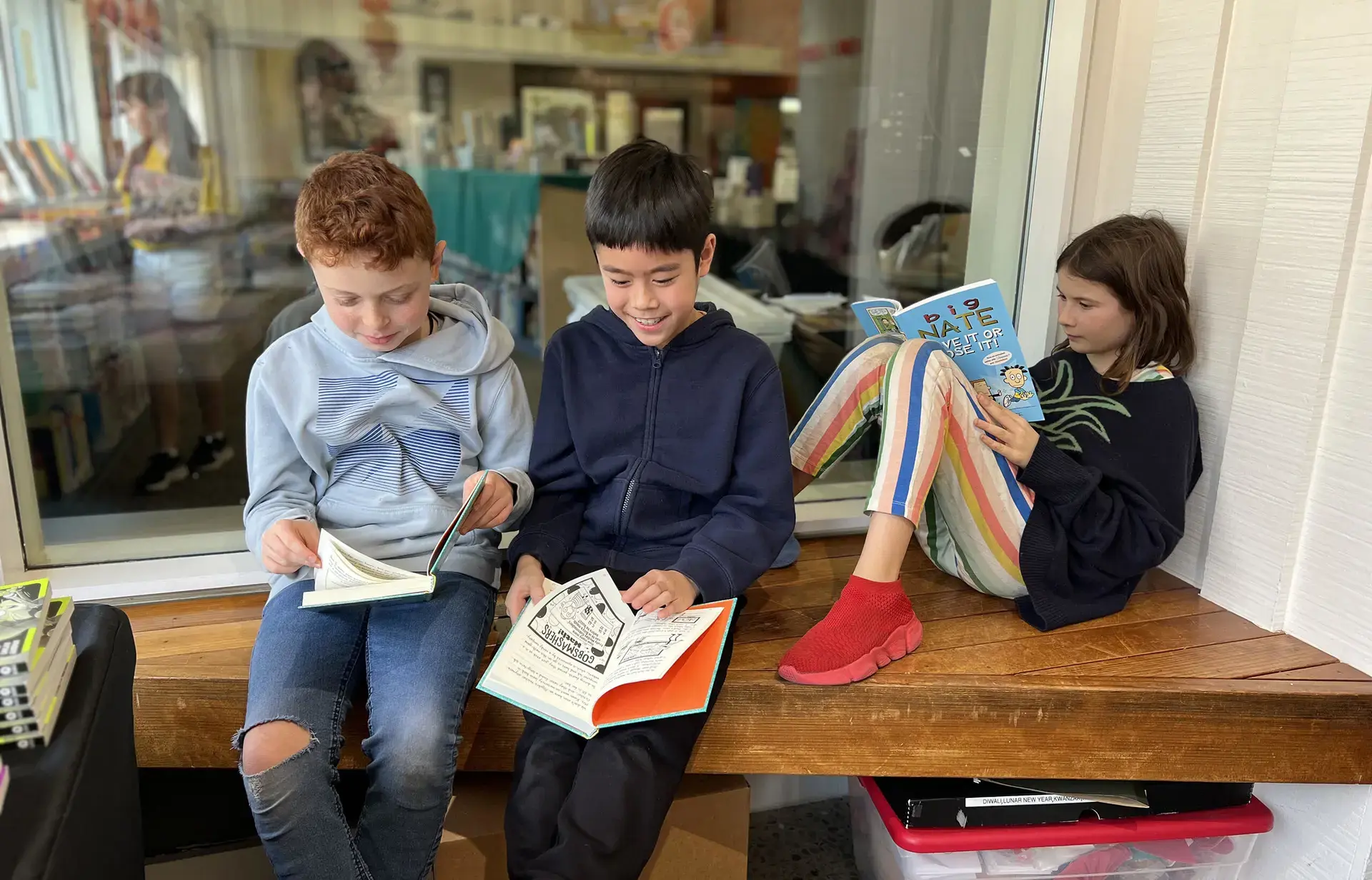Three students reading