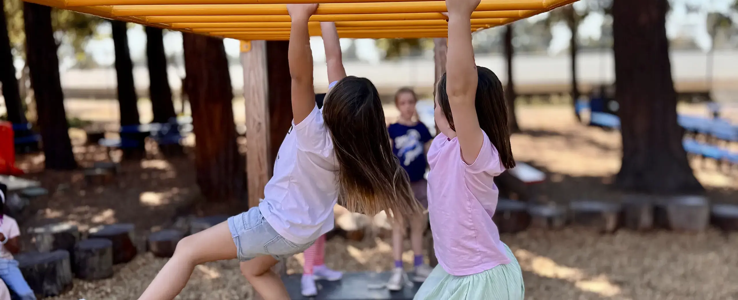 girls on monkey bars