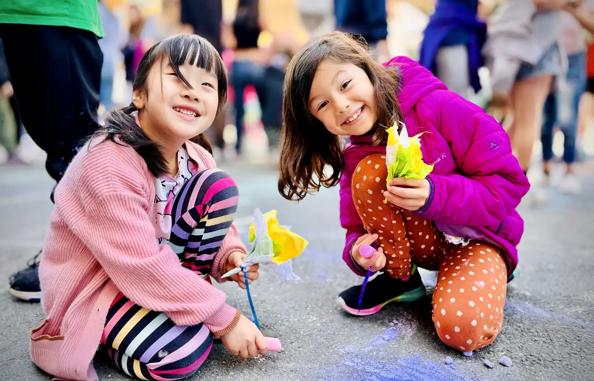 Two girls with chalk