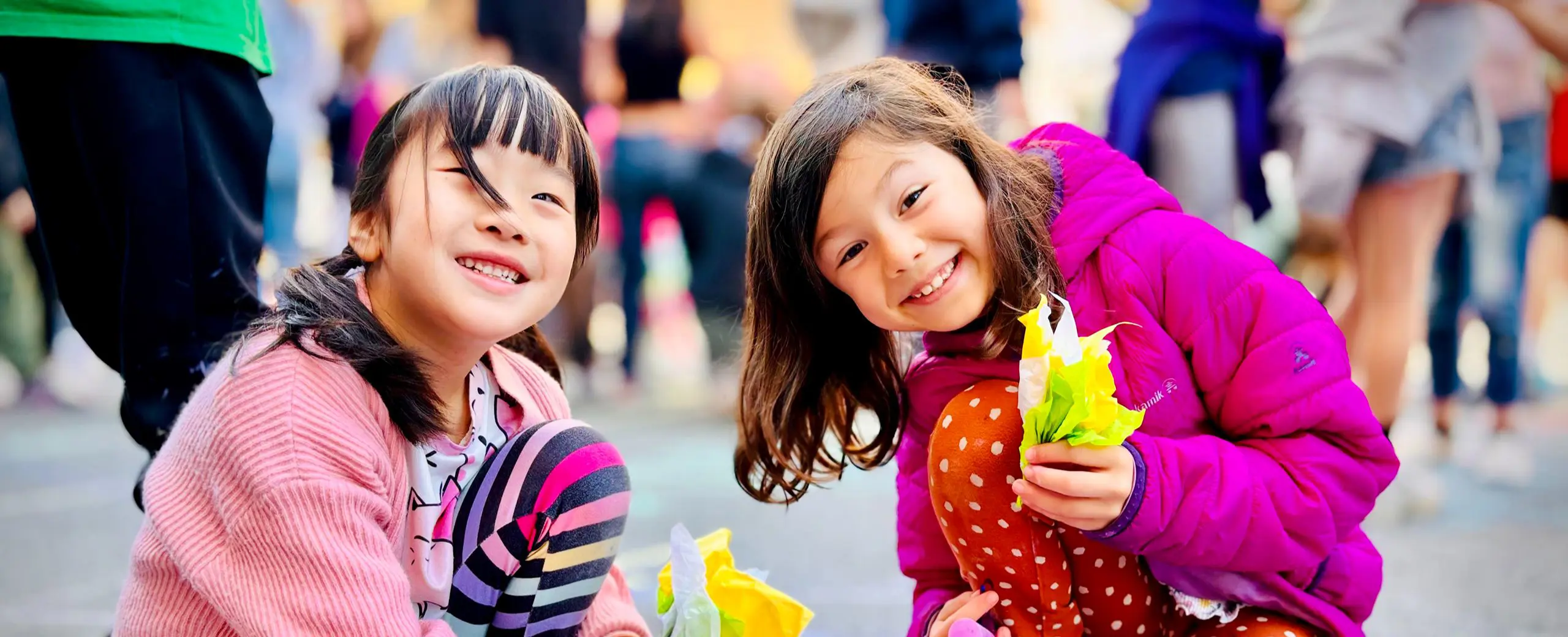 Two girls with chalk